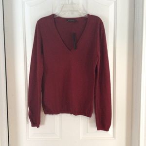 Classic burgundy v-neck sweater.